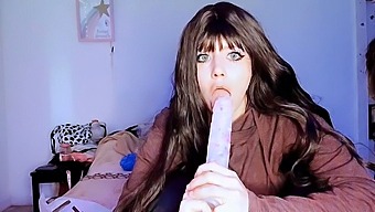 A Young Girl Dominates With A Massive Dildo In Oral Sex
