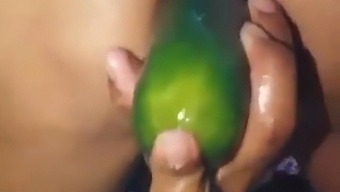 Stepmom Shows Off Her Open Ass While Pleasuring Herself With A Large Cucumber