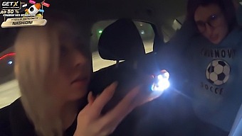 Two Friends Give Each Other Oral Pleasure In A Car Under The Watchful Eye Of The Police